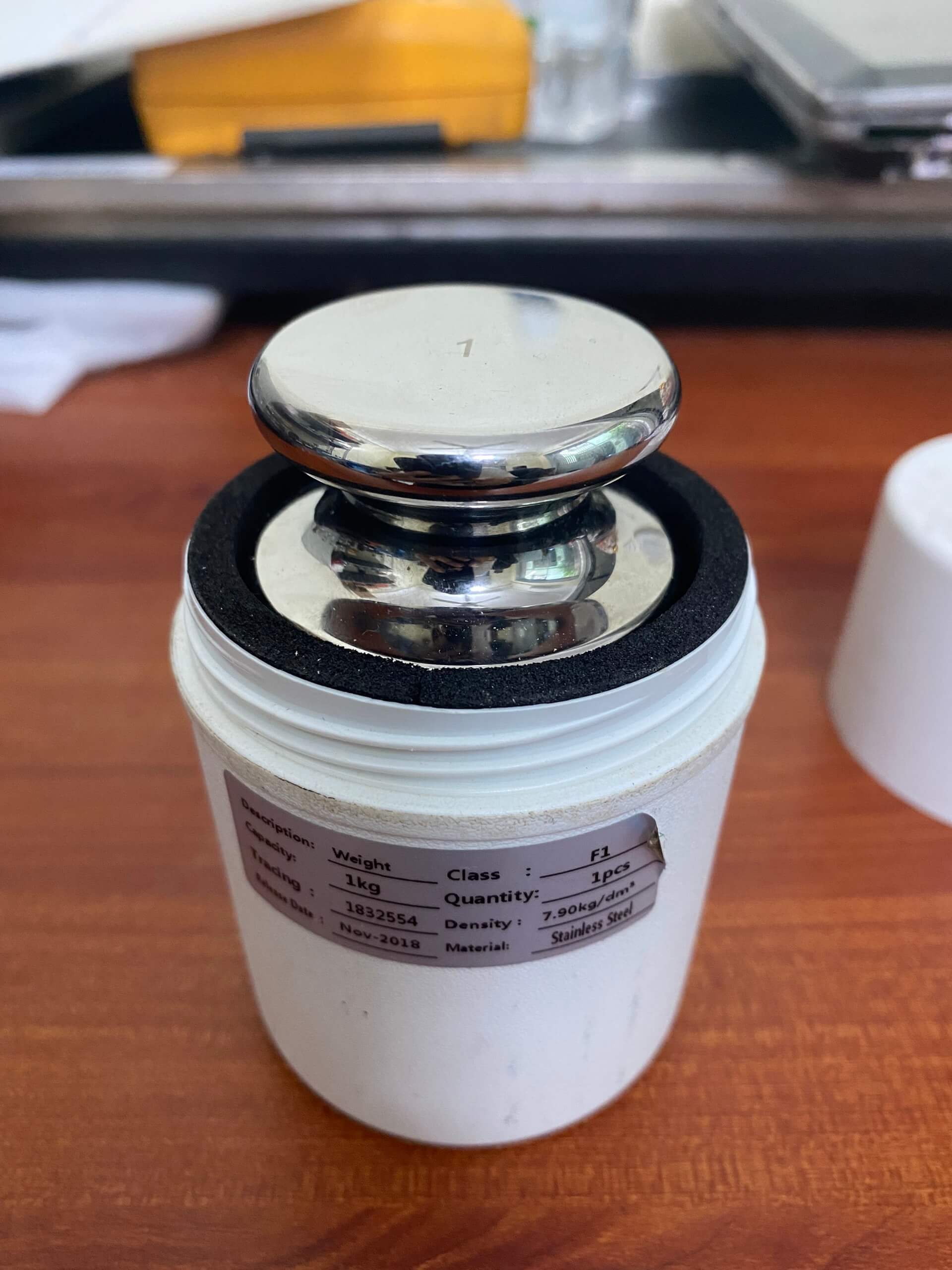 HIỆU CHUẨN QUẢ CÂN CẤP CHÍNH XÁC F1